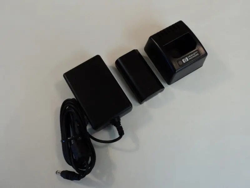 Hp Genuine Li-Ion Battery Charger & Ac Adapter Kit (Model C8873A) – Brand New 1